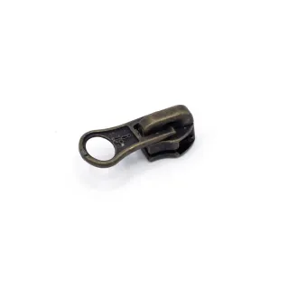 Cursor ovalado autoblocante para cremallera de cadena 7 en zama Ottone