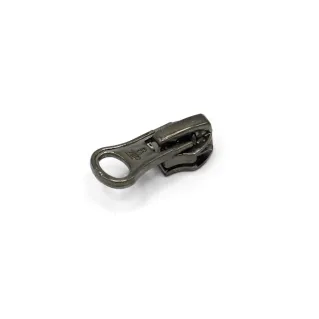 Self locking oval slider for 7 chain zip in zamak Canna di fucile
