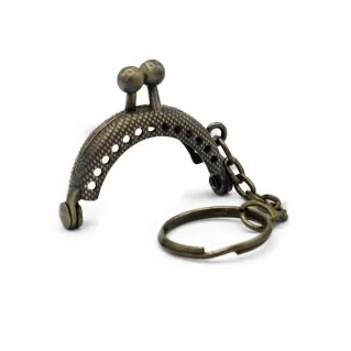 Porte-clés clic clac en métal Bronzo