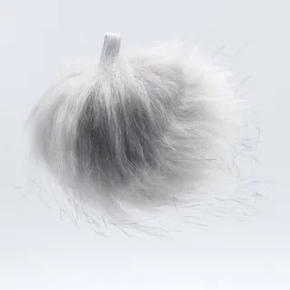 Pompom en fausse fourrure pour applications sur vetements et accessoires Perla