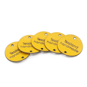 Etiquetas personalizadas círculo 5 pzs Polipiel blanco Giallo